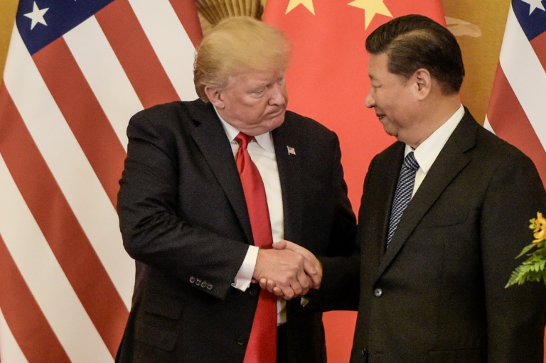 Os presidentes dos EUA, Donald Trump, e da China, Xi Jinping, em 9 de novembro de 2017 em Pequim