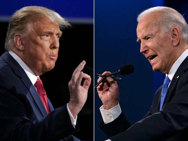 Donald Trump e Joe Biden durante o debate em Nashville em 22 de outubro