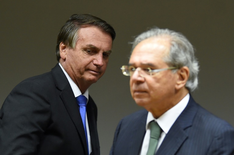 O presidente Jair Bolsonaro e o seu ministro da Economia, Paulo Guedes, durante uma coletiva de imprensa
