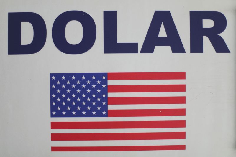 Placa com a palavra dólar e a bandeira dos EUA