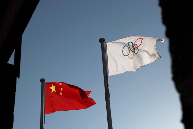 Bandeiras da China e Olimpíada em Pequim